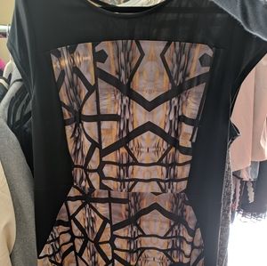 Designer dress, sophisticated and edgy